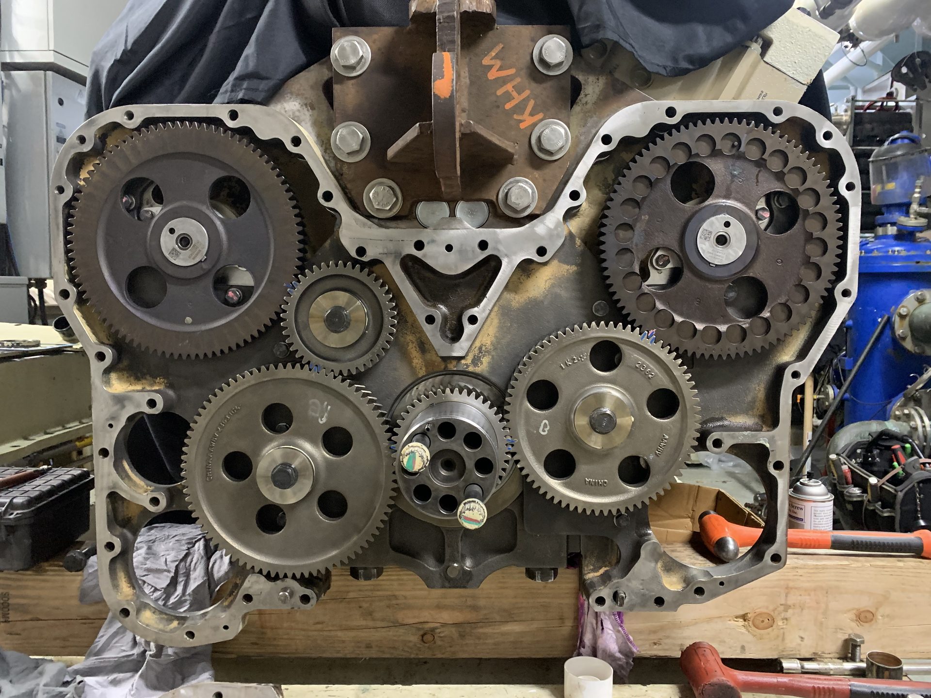 Front of a diesel engine with the cover off, showing the timing gear train
